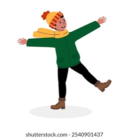 A happy child joyfully balancing on one leg in winter clothing while playing in a snowy landscape