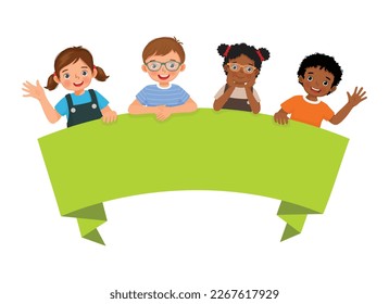 happy children boys and girls standing behind blank banner board waving hands