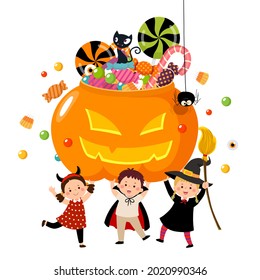 Happy children in Halloween costumes holding a pumpkin full of candies.
