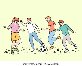 Happy children play football, running on sunny lawn and kicking football ball. Cheerful boys and girls enjoy summer holidays participating in soccer tournament for elementary school students