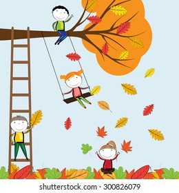 Happy children playing in the autumn leaves