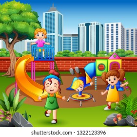 Happy children playing in the playground