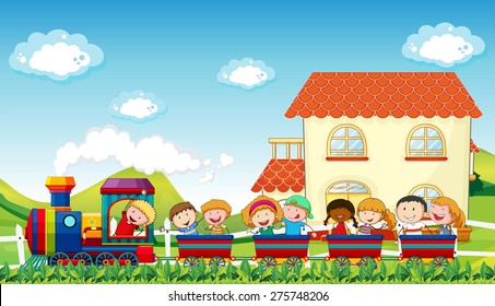 Happy children riding on a train along the field