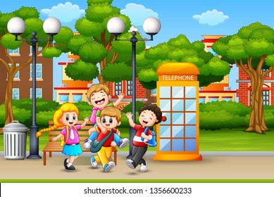 Happy children running and laughing in the city park