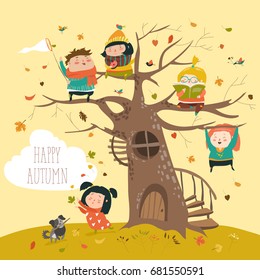 Happy children sitting on tree in autumn park