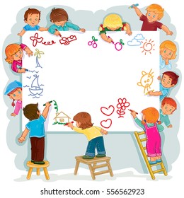 Happy children together draw on a large sheet of paper