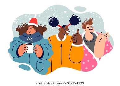Happy children in winter clothes rejoice at first snow and show thumbs up or wave hands in greeting. Multiethnic little kids having fun celebrating start of winter holidays or christmas.