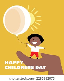 Happy Children's Day with Afro american babyboy in the palm of an adult on sun yellow background.