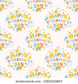 Happy Children's Day. Cute children's seamless pattern for the holiday Happy Children's Day. Hand-drawn vector colored letters, comet, clouds, stars, hearts, rainbow in cartoon style, poster template.