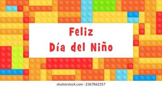 Happy Children's Day in Spanish language - Feliz Dia Del Nino. Greeting card or banner design with colorful toy construction blocks.