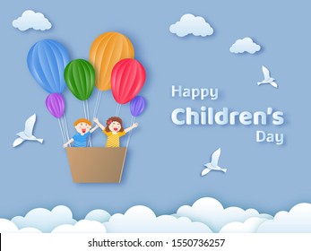 Happy Children's Day text with happy kids flying from hot air balloons on cloudy background in paper cut style. Can be used as greeting card or poster design.