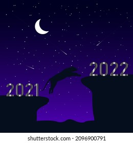 Happy Chinee New Year 2022. Tiger jumping from a cliff over a cliff in night. 