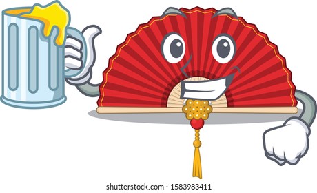 Happy chinese folding fan holding a glass with juice