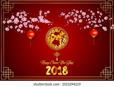 Happy Chinese New Year 2018 card with gold dog in frame and hanging chinese lantern on cherry branches