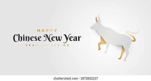 Happy Chinese new year 2021 year of the ox. Chinese New Year greeting banner decorated with gold silver ox in paper cut style on white background