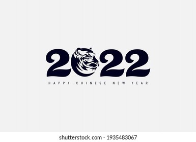 Happy Chinese New Year 2022, Vector design zodiac sign tiger on black paper cut art and craft style. Logo freehand drawing. Vector illustration. Isolated on white background.