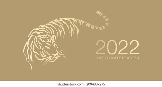 Happy Chinese New Year 2022 by gold brush stroke abstract paint of the tiger isolated on golden background.