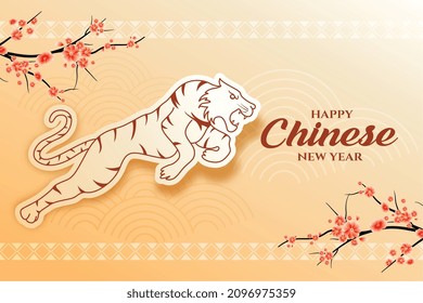 happy chinese new year 2022 card with sakura tree and jumping tiger