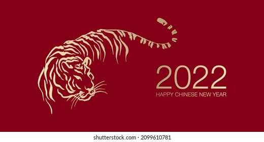 Happy Chinese New Year 2022 by gold brush stroke abstract paint of the tiger isolated on red background.