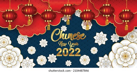 Happy Chinese New Year 2022. Paper cut flowers, clouds and hanging lanterns.