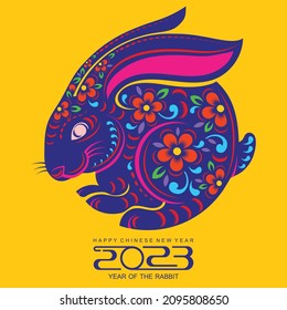 Happy chinese new year 2023 year of the rabbit zodiac sign, gong xi fa cai with flower,lantern,asian elements gold paper cut style on color Background. (Translation : Happy new year, rabbit year)