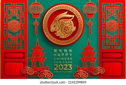 Happy chinese new year 2023 year of the rabbit zodiac sign with flower,lantern,asian elements gold paper cut style on color Background. (Translation : Happy new year)