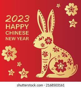 Happy Chinese new year 2023 Zodiac sign, year of the Rabbit, with gold paper cut art on red color background with chinese flowers