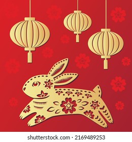 Happy Chinese new year 2023 Zodiac sign, year of the Rabbit, with gold paper cut art on red color background with chinese lanterns