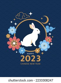 Happy Chinese New Year 2023. Vector cartoon illustration of a white sitting rabbit - a symbol of the 2023 New Year, surrounded by flowers, clouds, and stars. Isolated on the dark blue background