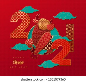 Happy Chinese New Year background.  2021 year of the bull paper art style. Ox silhouette with red and golden paper cut decoration. 