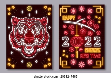 Happy Chinese New Year neon greetings card, flyers, poster. Vector illustration. Chinese New Year neon sign with sakura, lantern, china tiger for new year emblem, bright signboard, light banner.