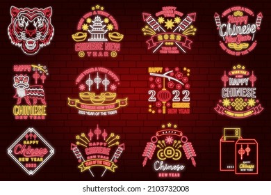 Happy Chinese New Year neon greetings card, flyers, poster. Vector illustration. Chinese New Year neon sign with sakura, lantern, china tiger for new year emblem, bright signboard, light banner.