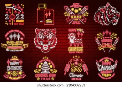 Happy Chinese New Year neon greetings card, flyers, poster. Vector illustration. Chinese New Year neon sign with sakura, lantern, china tiger for new year emblem, bright signboard, light banner.