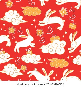 Happy Chinese New Year seamless pattern with celebration rabbits and gift boxes. Decorative seamless pattern for year of the rabbit 2023