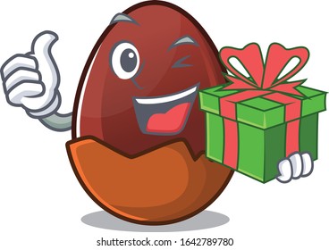 Happy chocolate egg character having a gift box