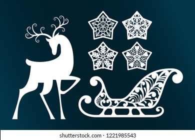 Happy Christmas, laser cut. Set of new year decorations. Isolated objects snowflakes, contour Deer, openwork sled.