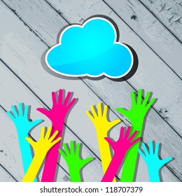 happy colorful hands with blue cloud on a striped wooden background