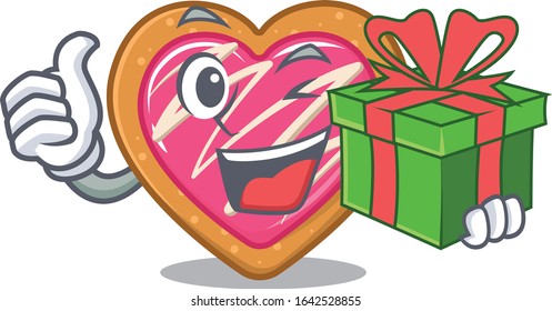 Happy cookie heart character having a gift box