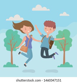 happy couple celebrating jumping in the forest scene