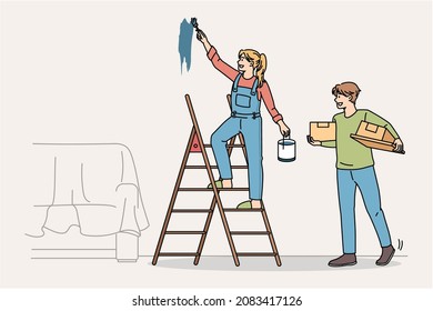 Happy couple do home renovation or decoration together. Smiling man and woman paint walls decorate repair house or apartment. Interior design concept. Vector illustration, cartoon character.