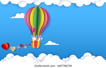 Happy couple flying in hot air balloon, vector illustration in layered paper cut craft style. Valentines Day greeting card, poster, banner template with copy space.