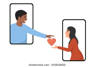 A happy couple holds a heart icon across the phone screen. A man passes a heart icon
to a woman online. Flat vector illustration