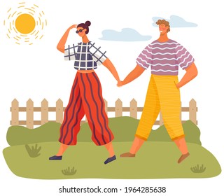 Happy couple in love walking in sunny day. Tall guy spends time with pretty girl summertime. Outdoor activity, romantic date. People in relationship walk on fresh air. Guy and girl walk by handle