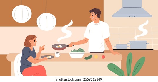 Happy couple relax. Man prepares breakfast. Morning meal. Fried eggs. Woman sitting at table. Weekend lunch. People cooking food together. Family relationship. Garish