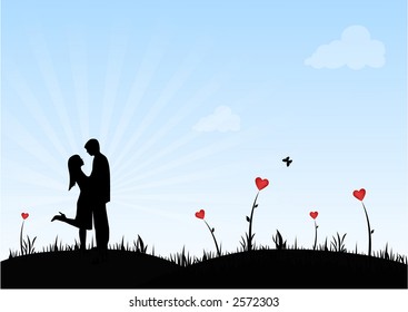 Happy couple surrounded by hearth shaped flowers;