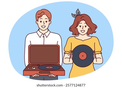 Happy couple with turntable and vinyl record invites you to retro party with jazz music. Young man and woman collecting vintage vinyl records with music from their favorite artists.