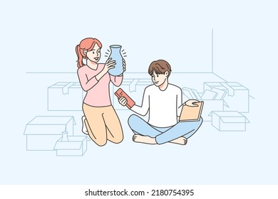 Happy couple unpacking boxes moving in together. Smiling man and woman open parcels sitting on floor in new home. Vector illustration. 