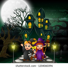 Happy couple witch in front of the haunted house with full moon background