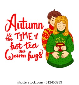 Happy couple. Young man embraces the girl who holds a cup of tea. Card with the inscription - Autumn is the time of hot tea and warm hugs. 