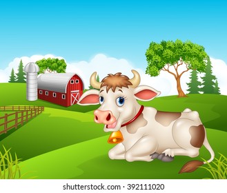 Happy cow sitting isolated in the farm